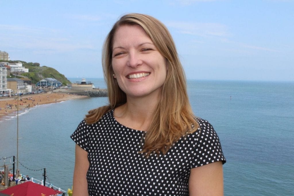 Alison Colley against a coastal backdrop