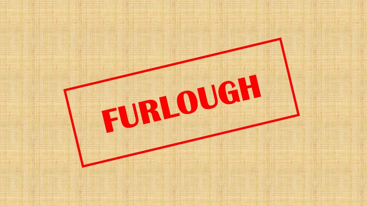The word furlough stamped on a brown envelope
